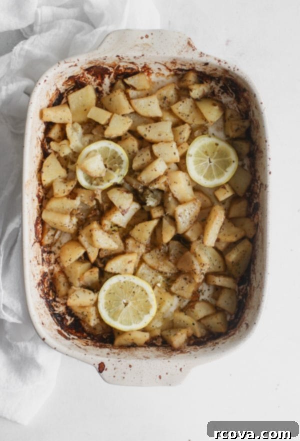 Whole30 Greek Lemon Roasted Potatoes 4 Fresh Russet potatoes, peeled and diced into even 1-inch chunks, ready for braising.