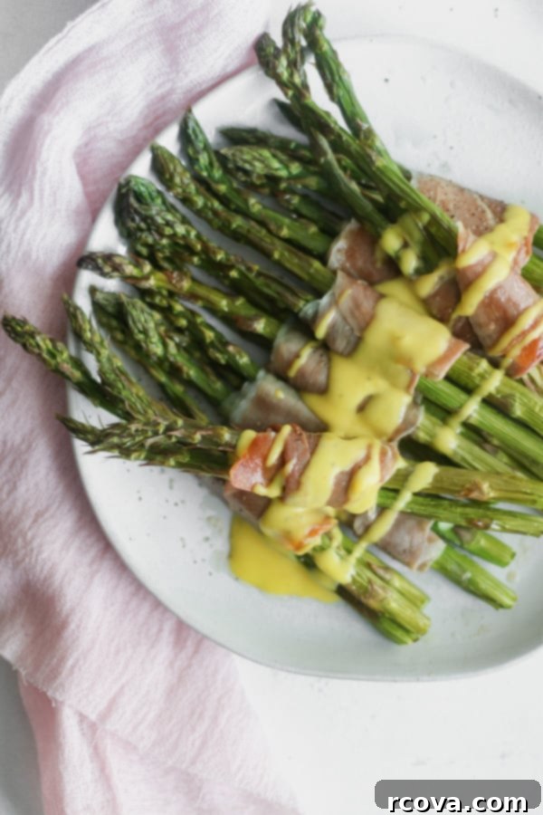 Easy Whole30 Blender Hollandaise 6 A serving of Whole30 Blender Hollandaise Sauce beautifully presented, ready to complement a variety of dishes.