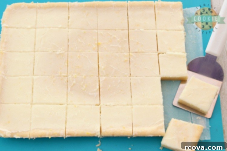 Sunshine Lemon Bars 5 Ingredients for Lemon Sugar Cookie Bars laid out on a baking sheet, showcasing fresh lemons, butter, sugar, and flour.