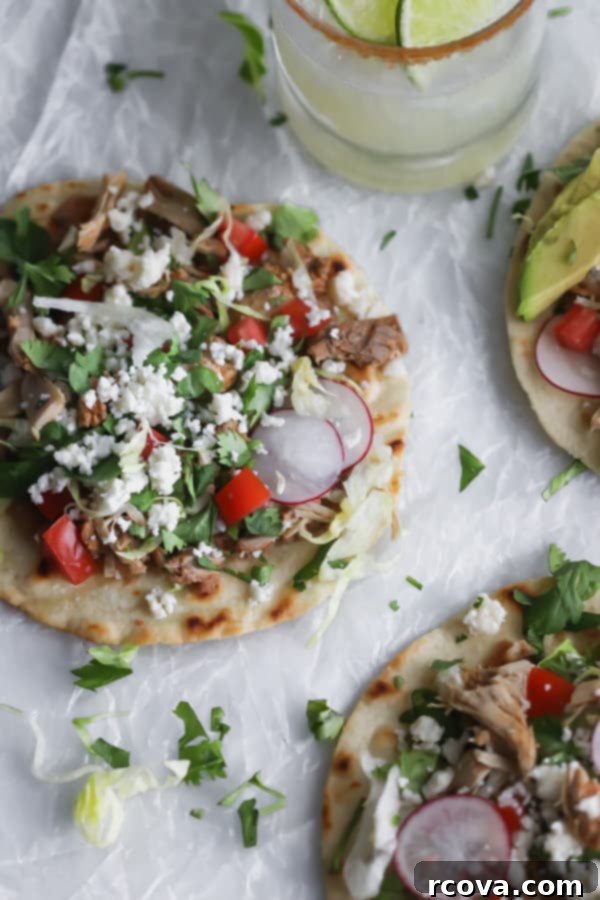 Whip Up Amazing Chicken Tostadas 7 Hands holding an easy chicken tostada