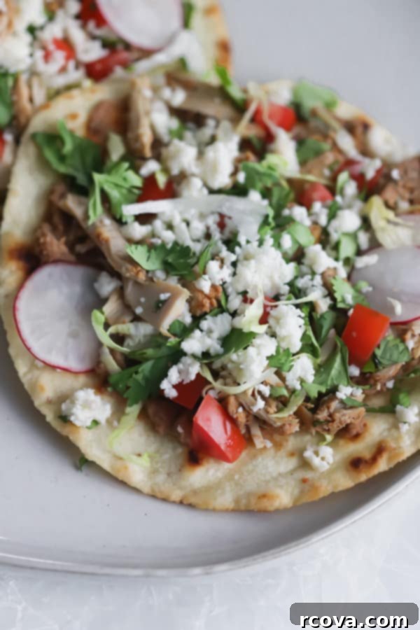 Whip Up Amazing Chicken Tostadas 8 Easy chicken tostadas garnished with fresh cilantro and radish