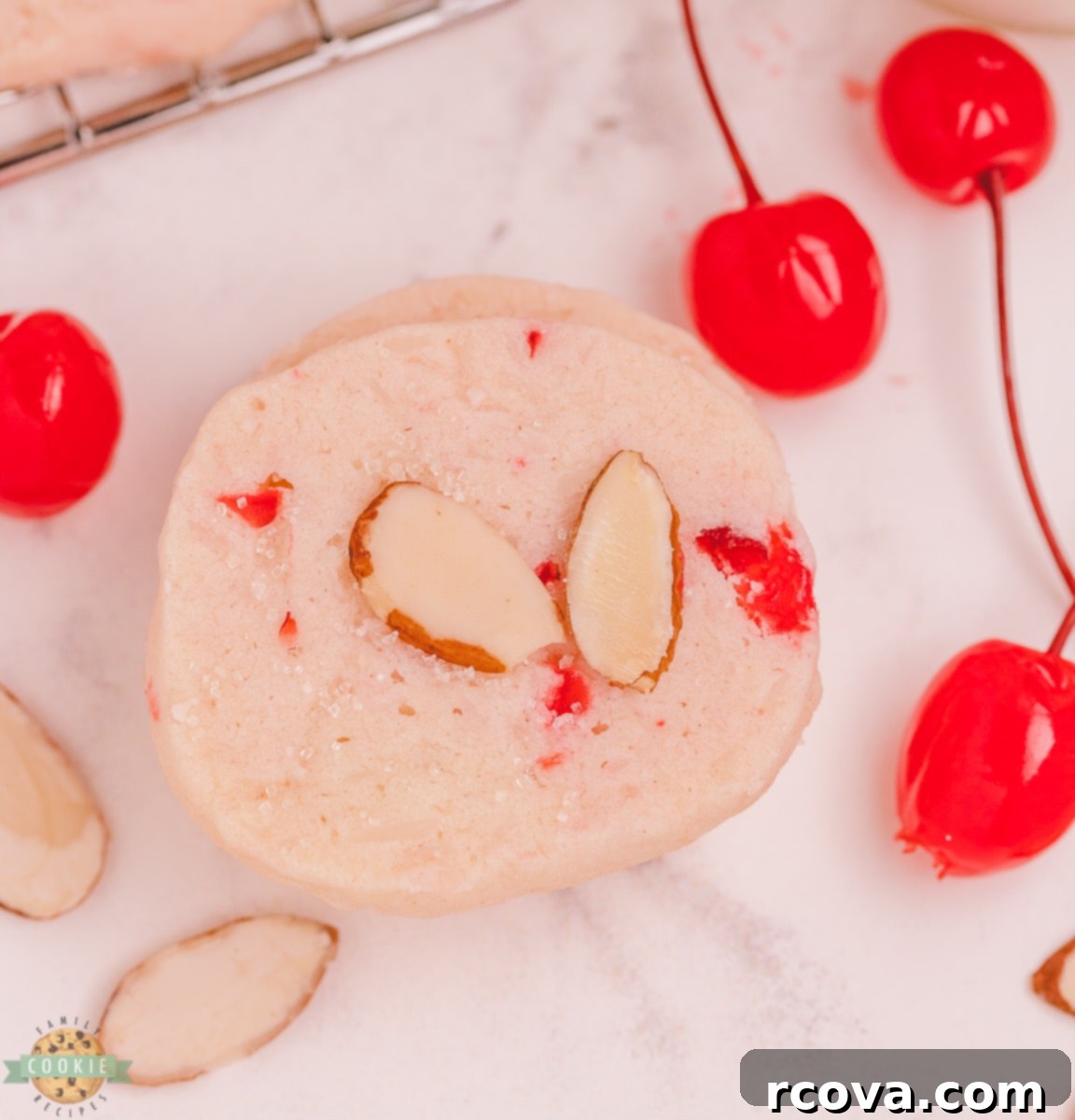 Tropical Cherry Almond Shortbread 2 shortbread cookies with cherries, almond and coconut
