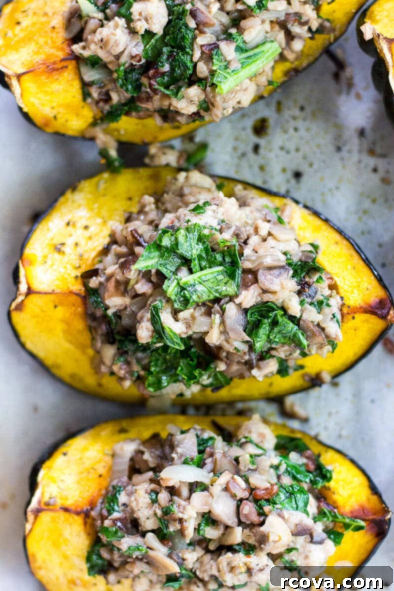 Savory Stuffed Acorn Squash with Sausage and Mushrooms 7 A final close-up of the baked Sausage & Mushroom Stuffed Acorn Squash, showcasing the rich, golden color and steam from the filling.