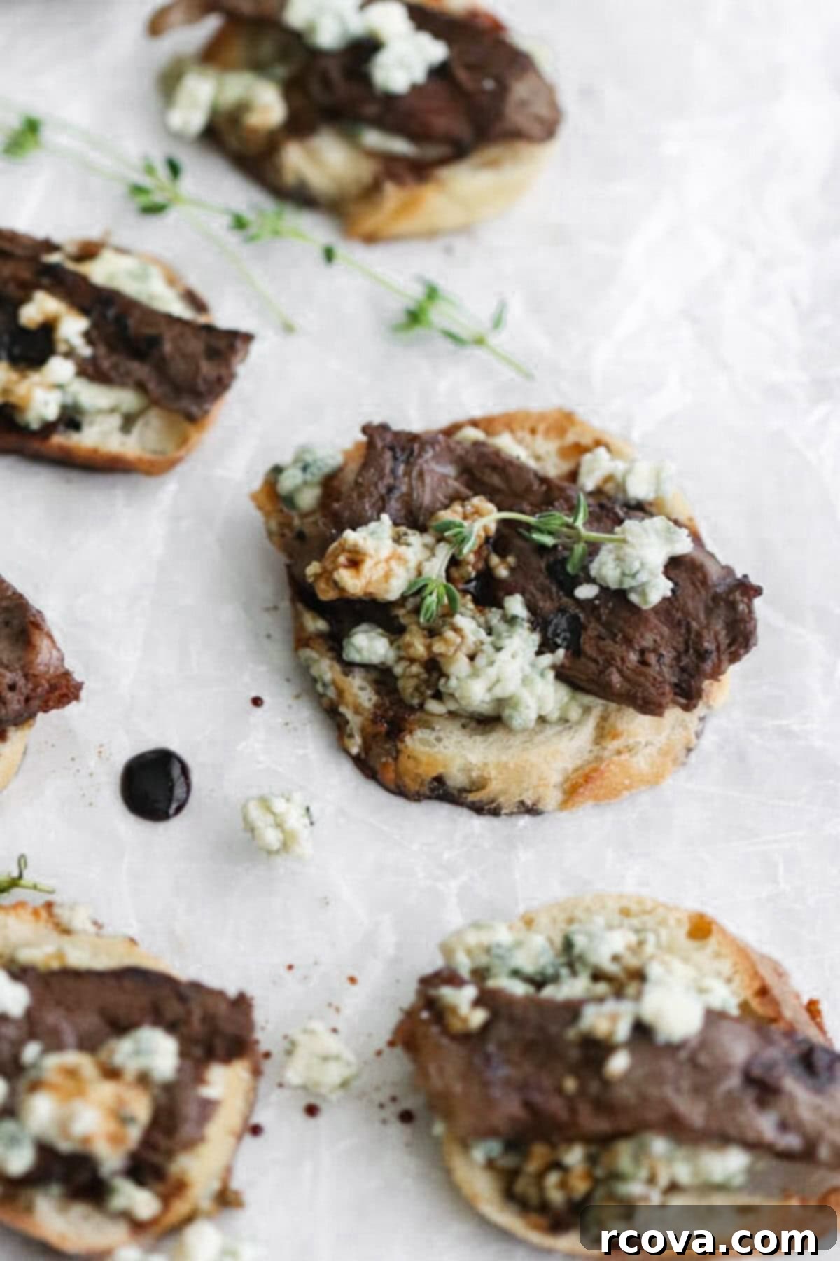 Steak and Blue Cheese Crostini The Ultimate Party Bite 2 Blue Cheese Steak Crostini appetizer with balsamic glaze