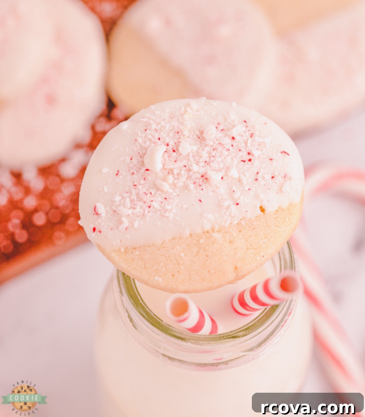 Buttery Peppermint Shortbread Delights 4 Peppermint shortbread cookie next to a glass of milk, highlighting its festive appeal.