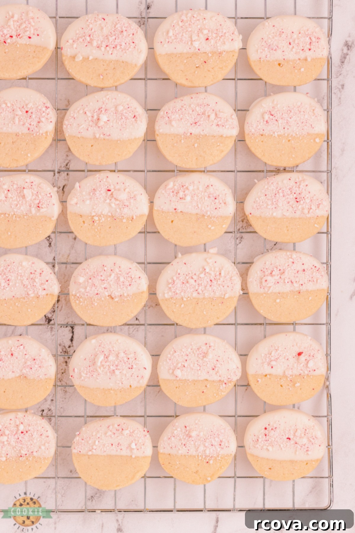 Buttery Peppermint Shortbread Delights 10 Freshly baked peppermint shortbread cookies cooling on a wire rack.