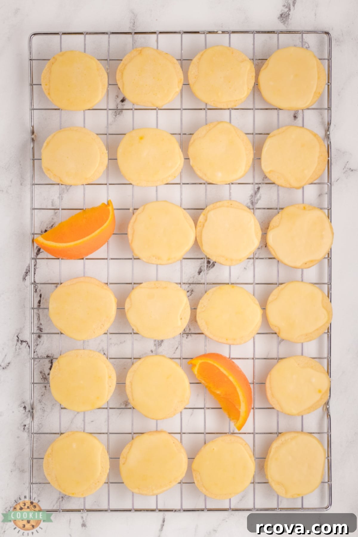 Zesty Orange Shortbread Bites 7 buttery orange cookies on a cooling rack