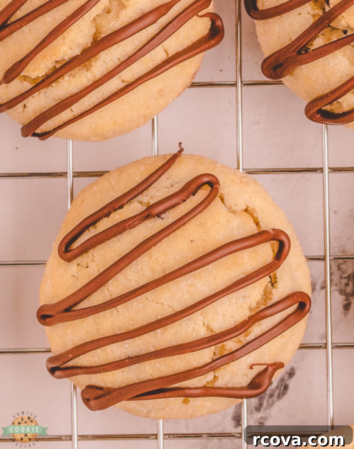 Melty Choc-Chip Perfection 7 Single chocolate chip scookie on a cooling rack after baking