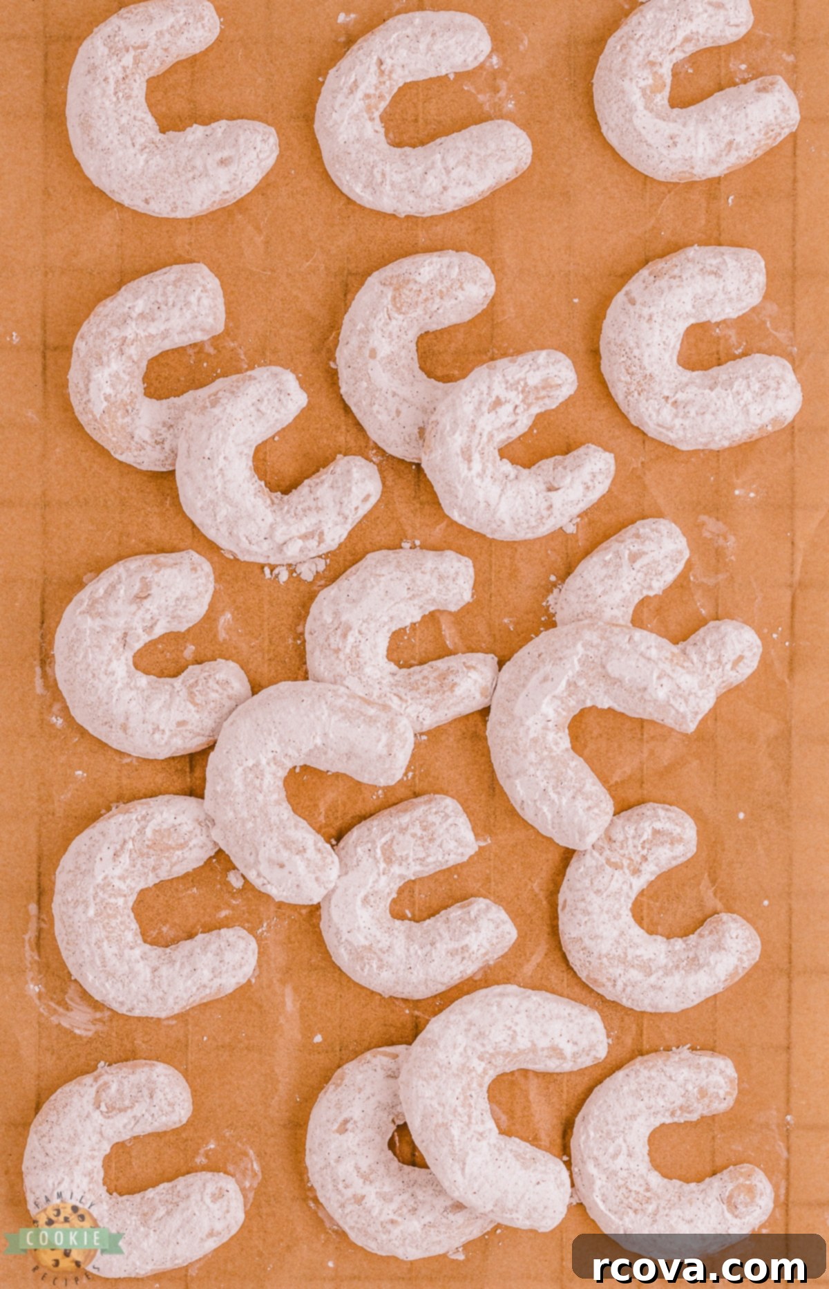 Golden Cinnamon Almond Moons 7 sheet pan full of crescent cookies