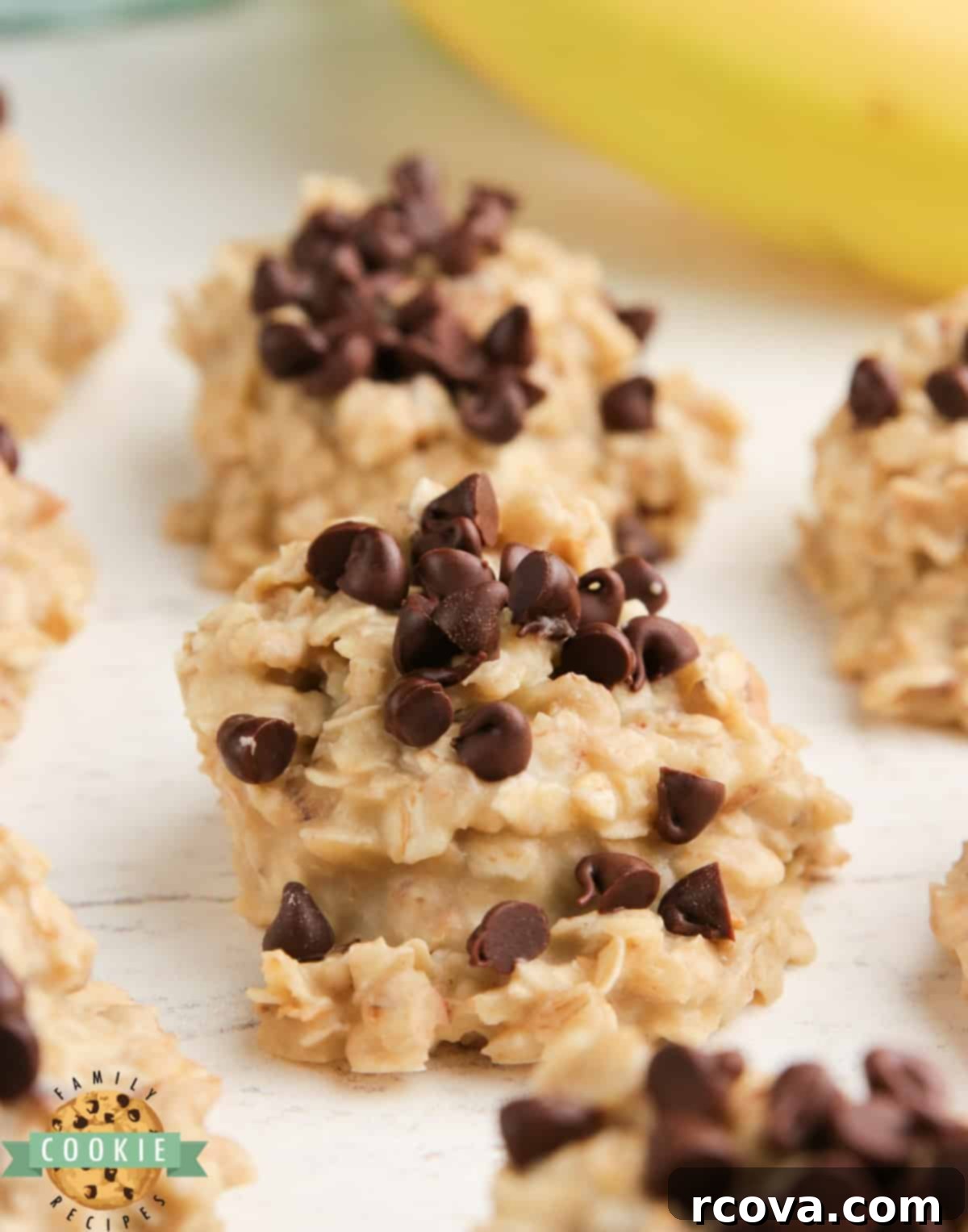 Effortless Banana Oat Treats 9 A selection of banana no-bake cookies with varying toppings, presented on a plate.