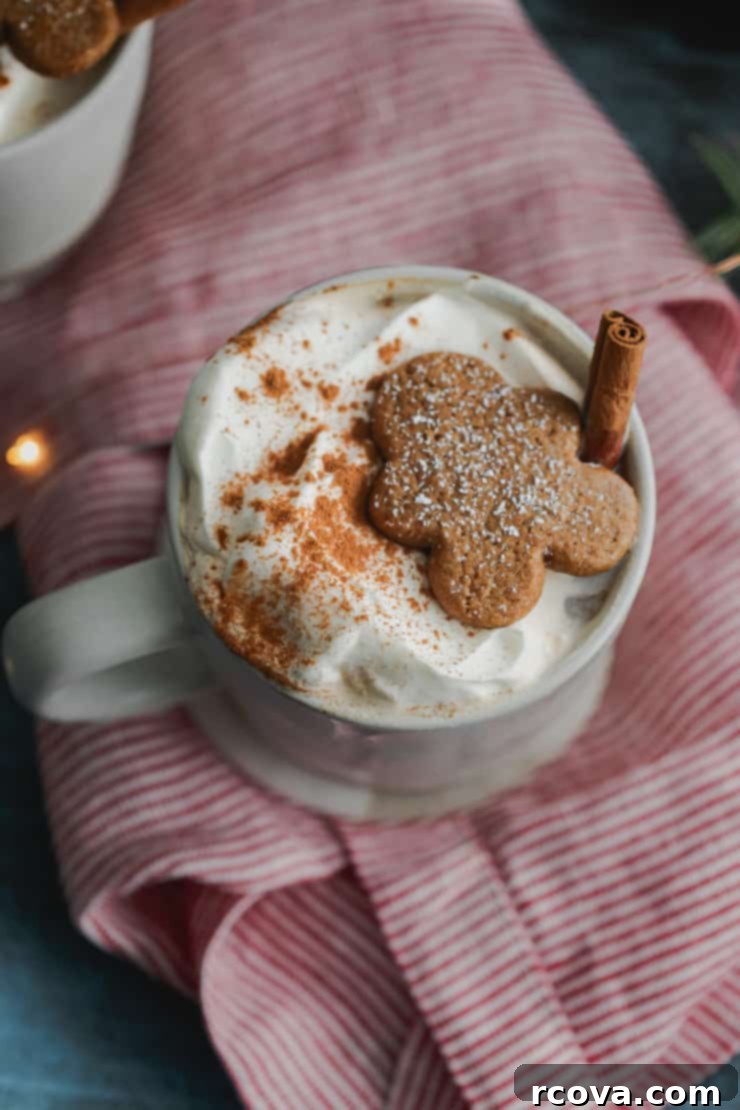 Cozy Homemade Gingerbread Latte 4 A glass mug filled with homemade gingerbread latte, ready to be enjoyed.