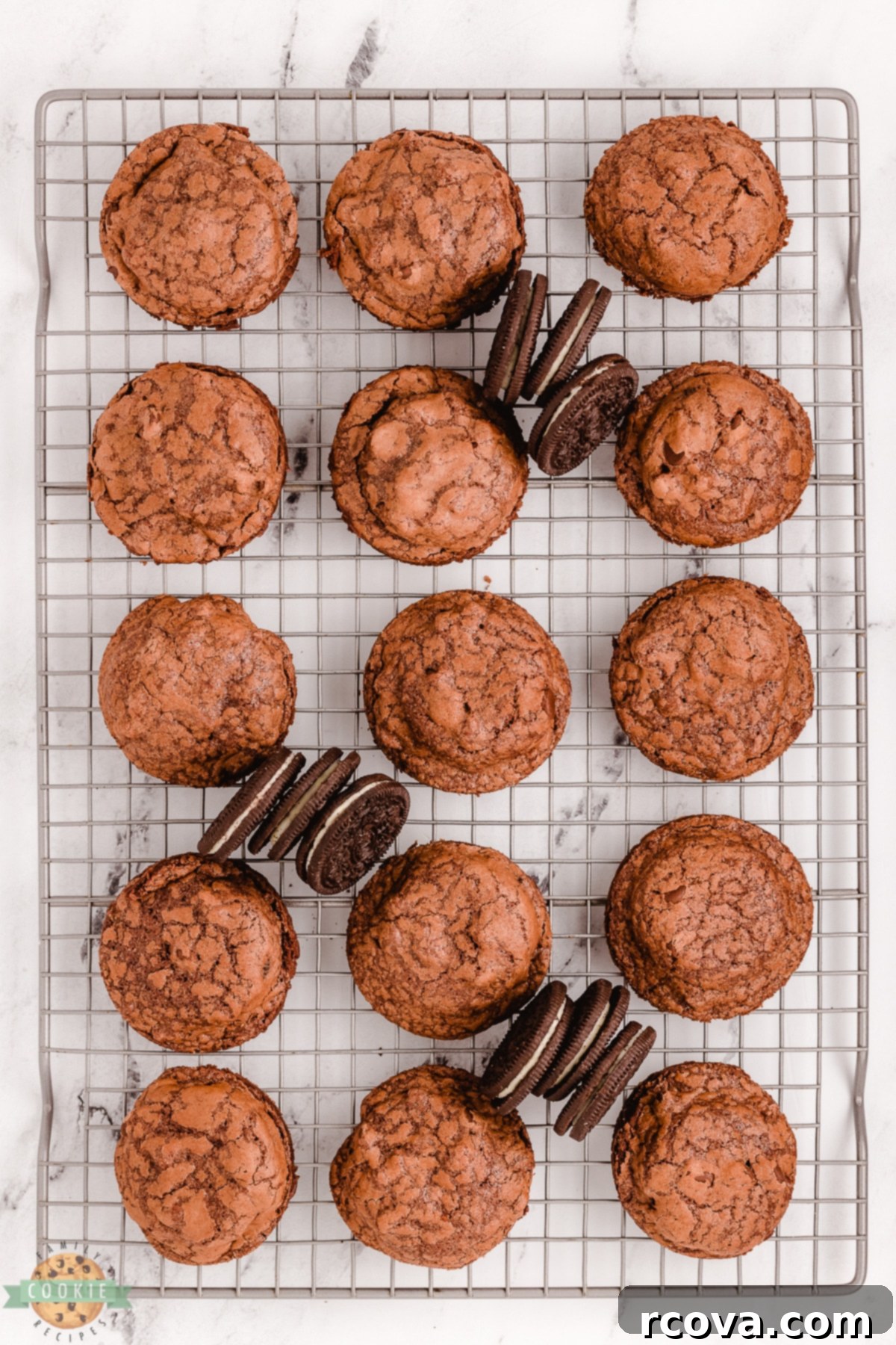 Decadent Oreo-Stuffed Brownie Cookies 7 oreo brownie cookies on a cooling rack