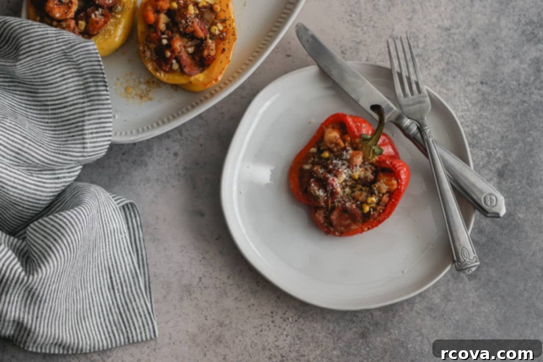 Savory Bell Peppers Filled with Gluten-Free Jambalaya 7 cooked jambalaya stuffed peppers in a pan