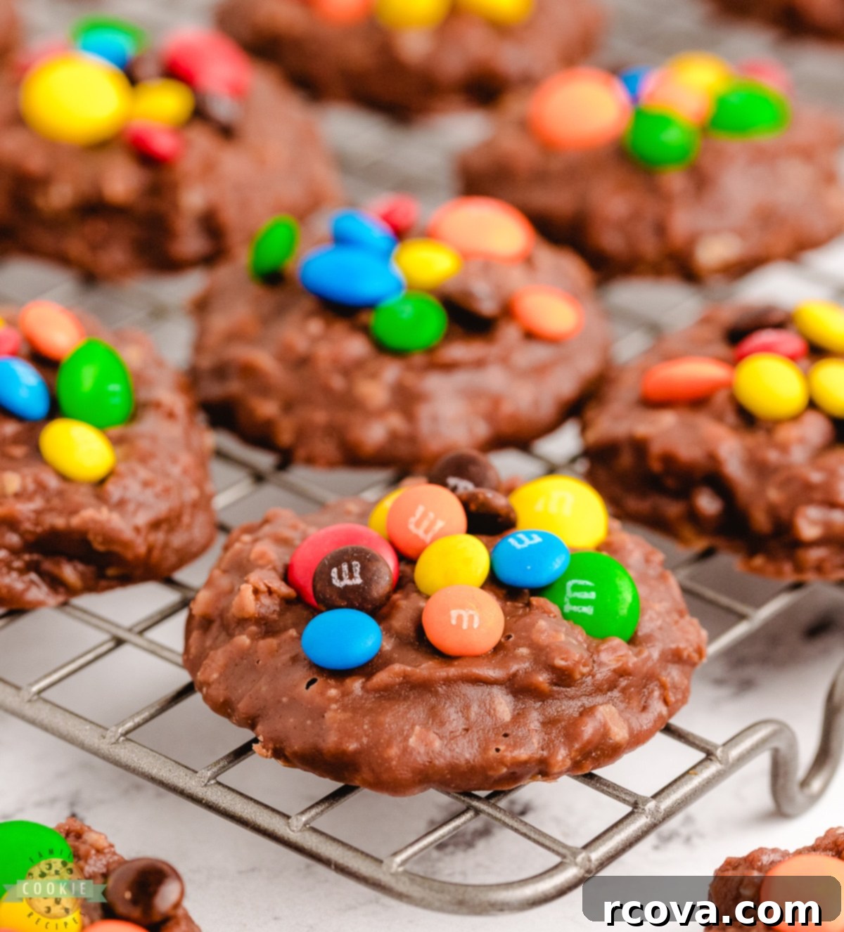 No-Bake M&M's Cookies 2 no bake M&M cookies on a cooling rack