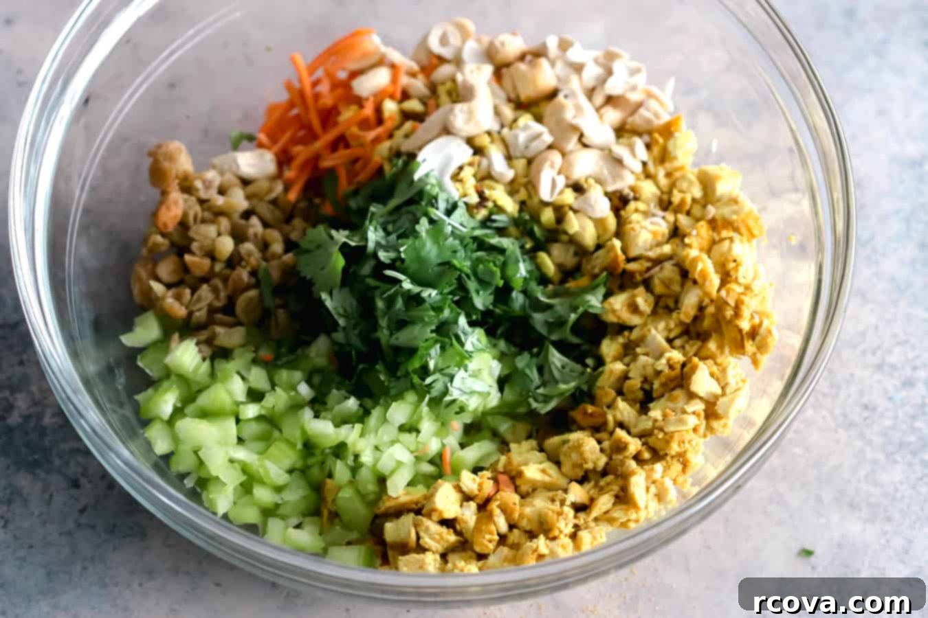 Fast and Flavorful Curried Chicken Salad 5 Ingredients for the curry dressing, including mayonnaise, Dijon mustard, and curry powder, ready to be mixed