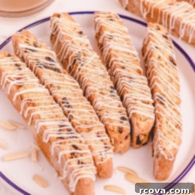 Double-Baked Cherry Delights 10 Cherry almond biscotti with white chocolate on a plate