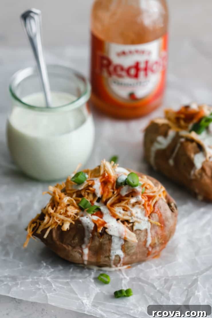 Whole30 Buffalo Chicken Loaded Sweet Potatoes 5 Close-up of a Whole30 Buffalo Chicken Stuffed Sweet Potato ready to eat