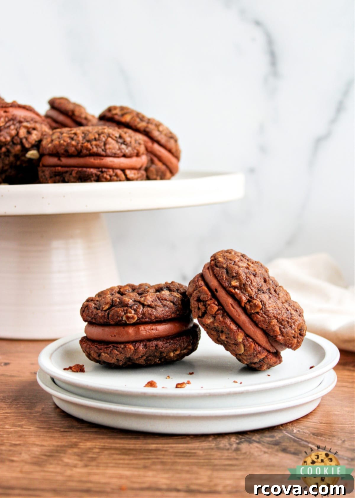 Velvet Chocolate Oatmeal Cream Pies 5 A batch of freshly baked chocolate oatmeal cookies cooling on a wire rack