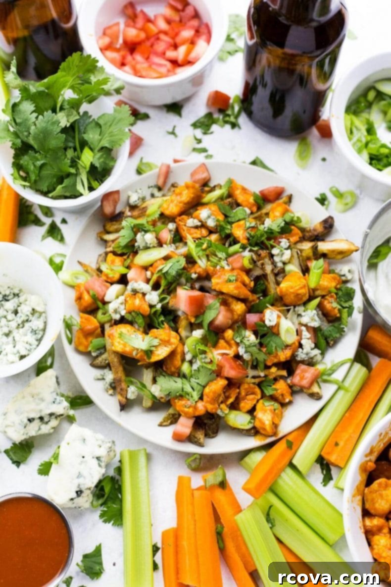 Fiery Buffalo Loaded Fries 2 Loaded Buffalo Chicken Fries, golden brown fries topped with spicy chicken, melted mozzarella, crumbled blue cheese, green onions, and diced tomatoes.