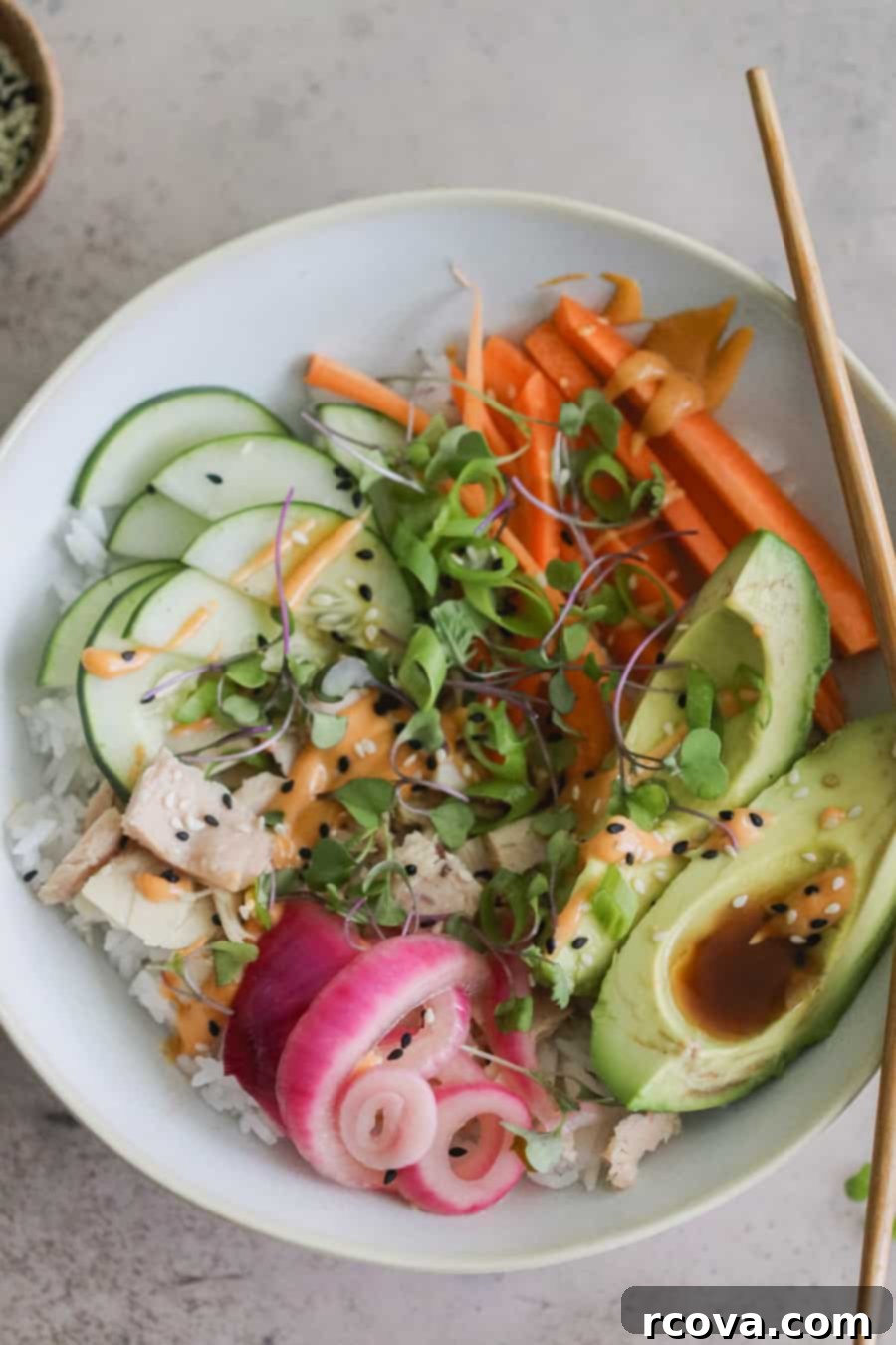Effortless Canned Tuna Roll Bowl 2 Fresh and vibrant Tuna Roll Bowl with sticky rice, tuna, avocado, cucumber, and spicy mayo.