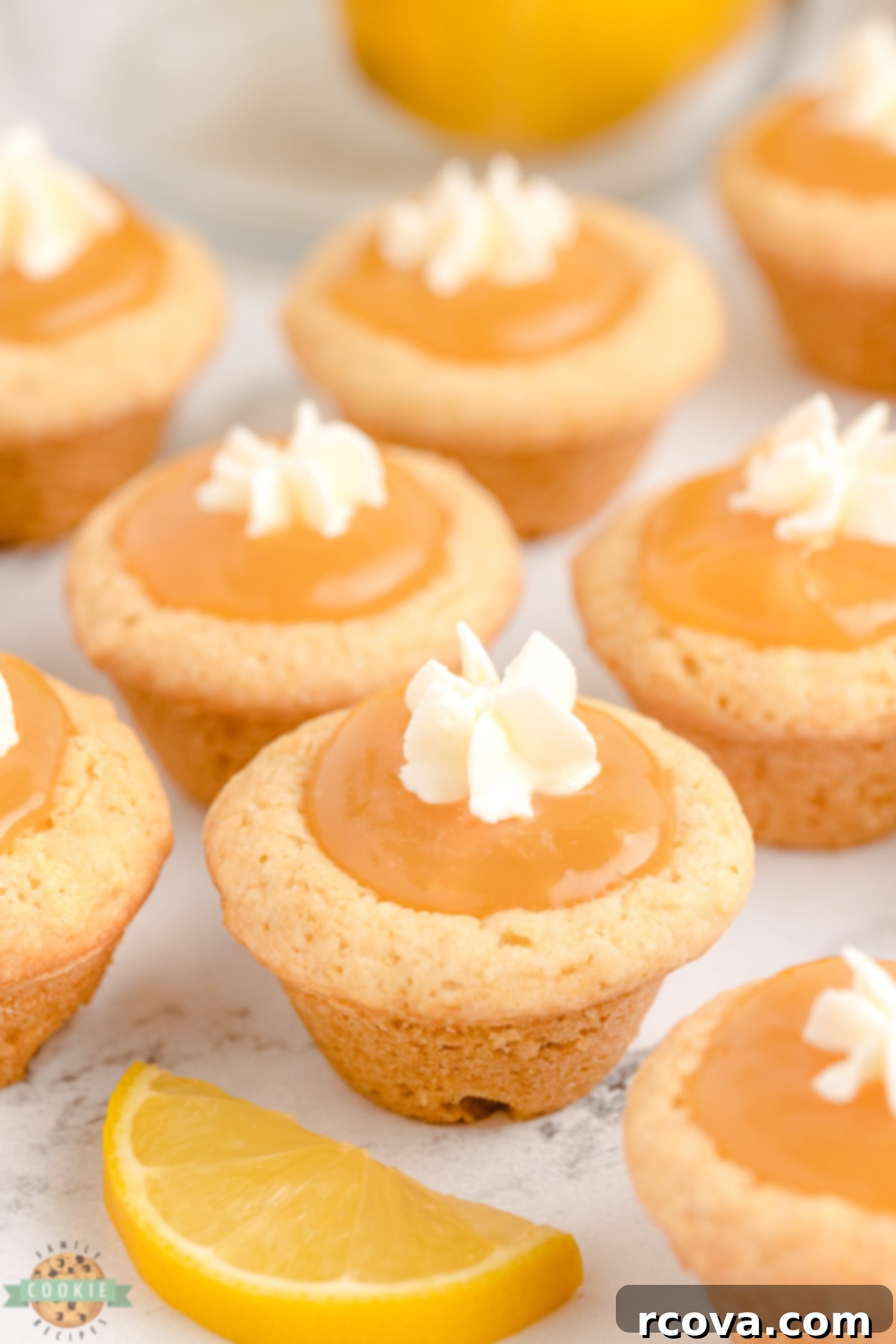 Zesty Lemon Curd Cookies 5 lemon curd cookies with elegant whipped cream stars on top