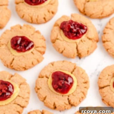 Dreamy Raspberry Cheesecake Cookies 7 Delicious graham cracker cookies topped with creamy cheesecake filling and a dollop of bright raspberry pie filling.