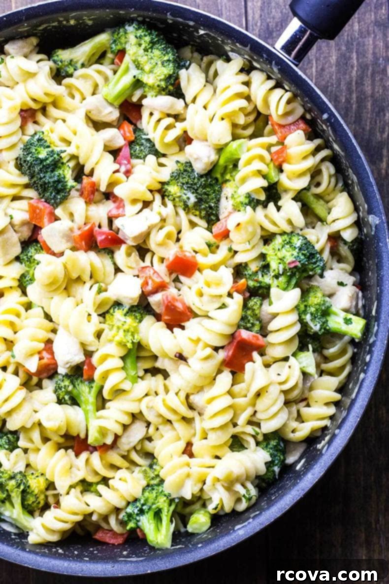 One-Pan Creamy Chicken Broccoli Alfredo 4 Broccoli Chicken Alfredo Skillet: A close-up of the finished dish with creamy sauce and pasta.