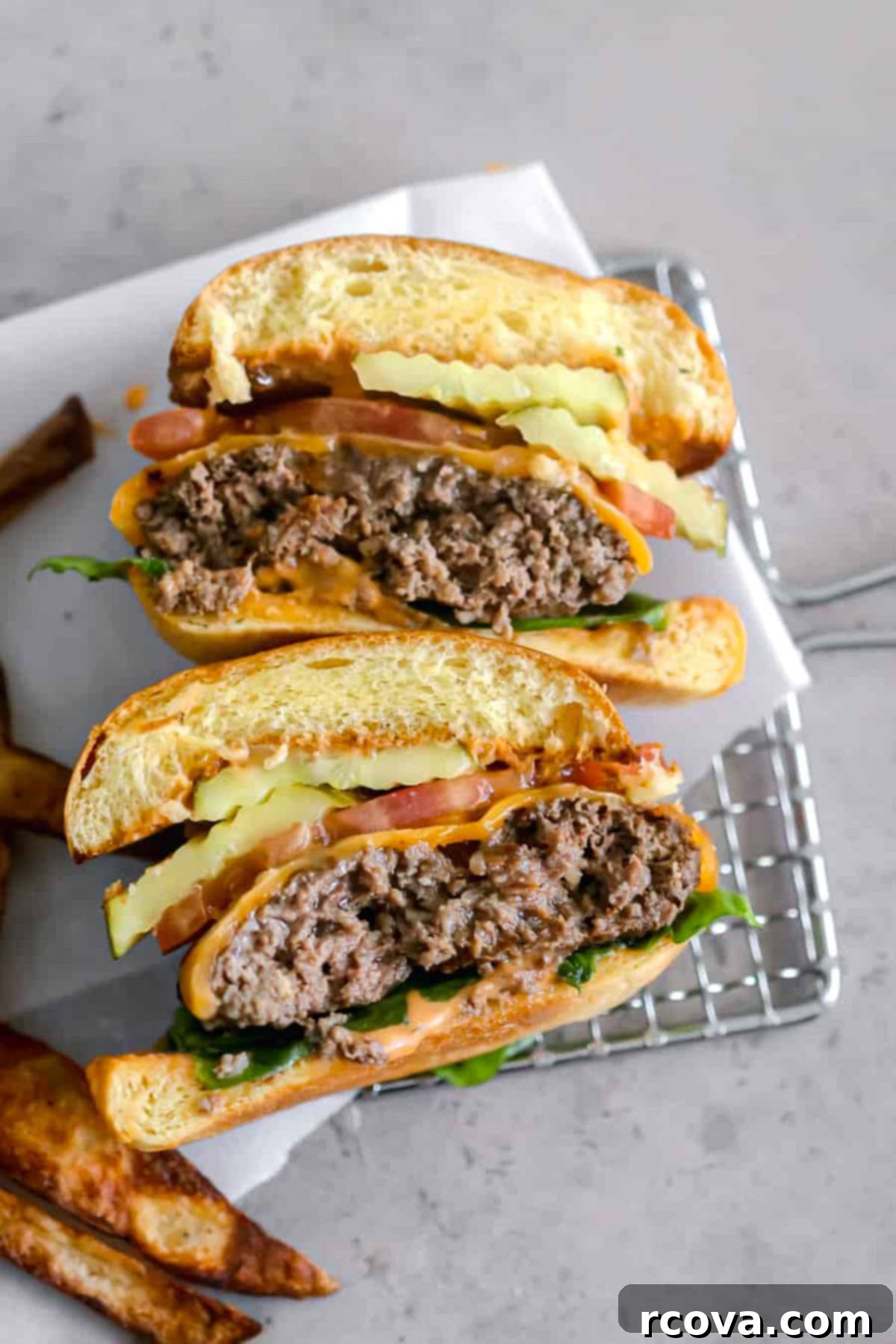 Flawless Grilled Beef Burgers 2 Classic grilled beef burger on a bun with fresh toppings