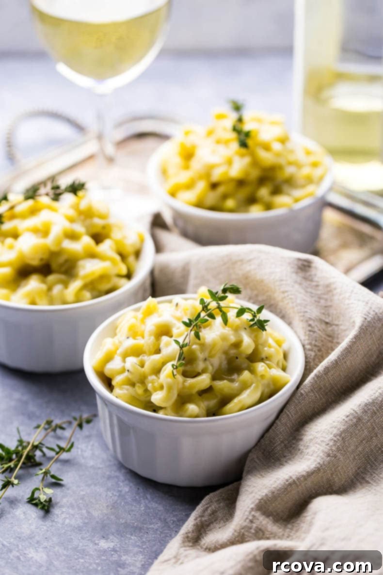 Decadent White Truffle Cheddar Mac 10 A stunning overhead shot of White Cheddar Truffle Mac and Cheese, freshly prepared and steaming, inviting you to take a bite.