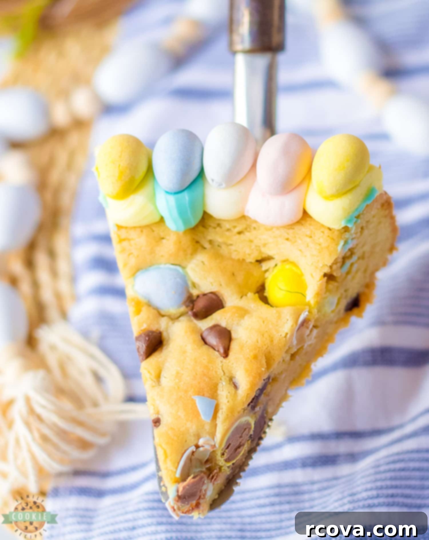 Festive Easter Cookie Cake 3 serving up a slice of Easter cookie cake