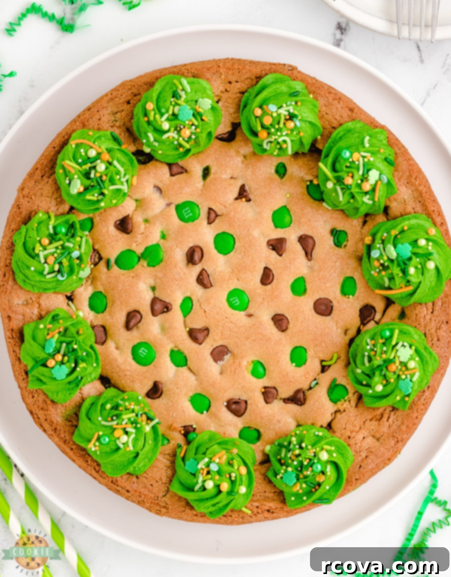 St Patricks Day Green Cookie Cake 4 A beautifully frosted whole St. Patrick's Day cookie cake, ready to be sliced and served.