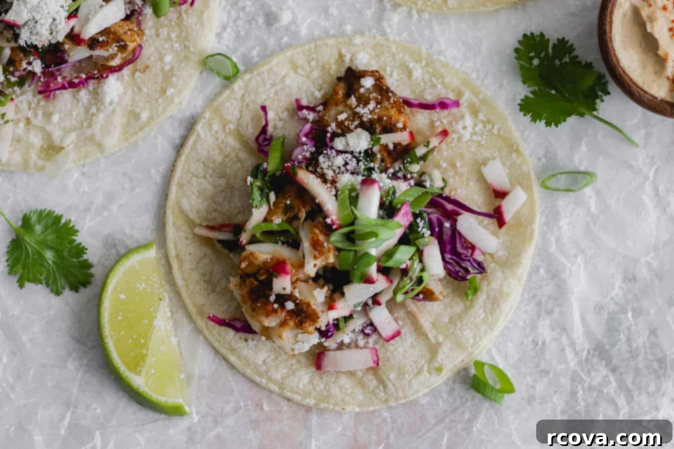 Flaky Fish Tacos with Speedy Cilantro-Radish Salsa 5 Assembled Flaky Fish Tacos Ready to Eat