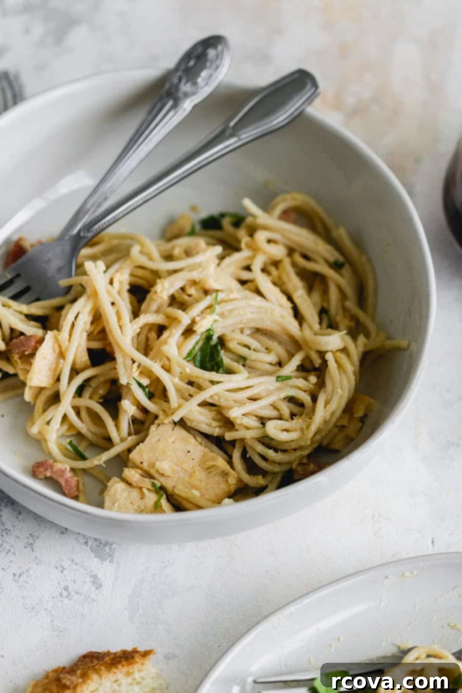 Effortless Canned Tuna Carbonara 4 A bowl of freshly prepared Tuna Carbonara pasta with garnishes