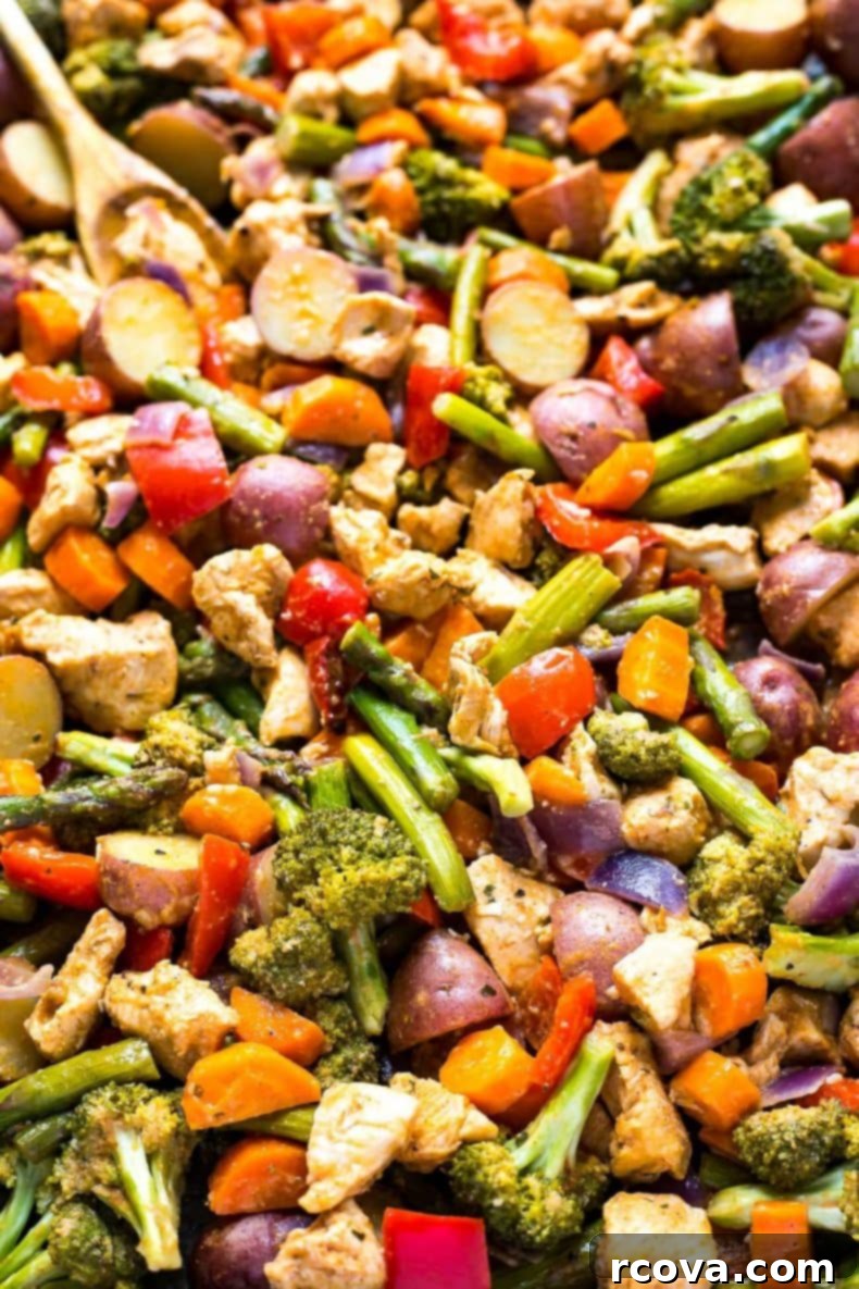 One-Pan Sriracha Ranch Chicken 5 Close-up of Sriracha Ranch Sheet Pan Chicken, showcasing the crispy chicken pieces and caramelized vegetables.