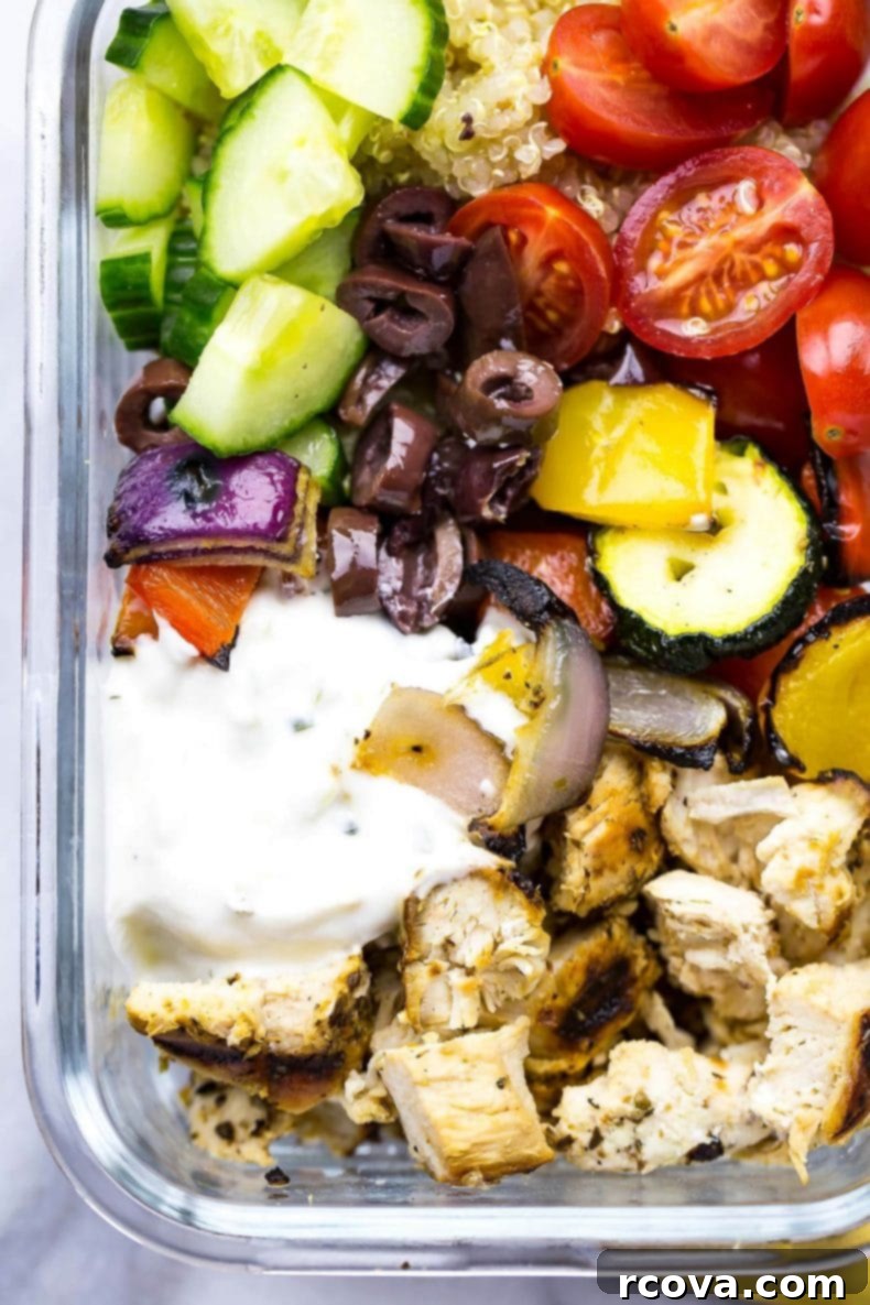 Meal Prep Chicken Souvlaki Bowls 7 Stacked Meal Prep containers with Chicken Souvlaki Bowls