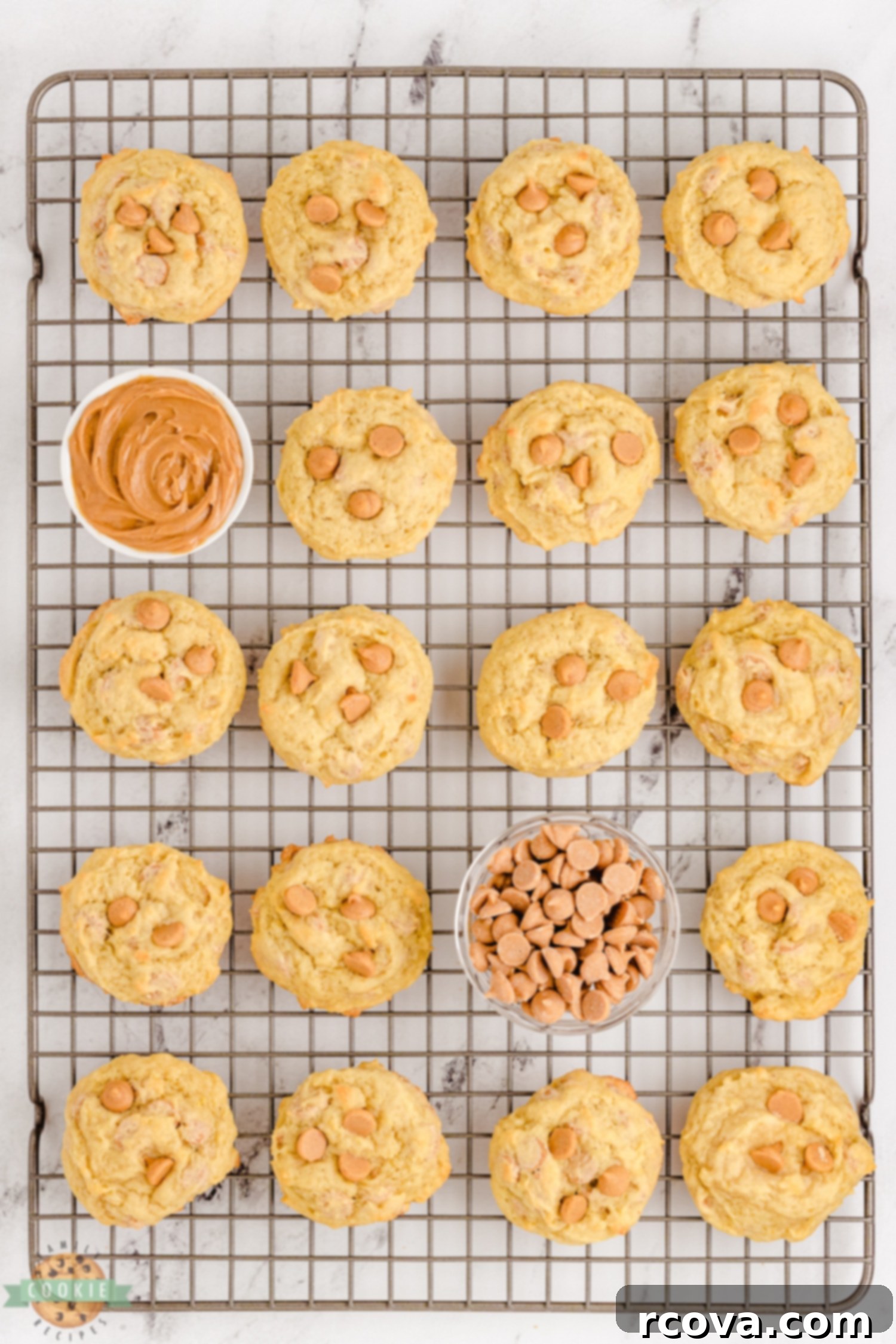 Peanut Butter Banana Bliss Bites 6 Freshly baked Peanut Butter Banana Cookies cooling on a wire rack.