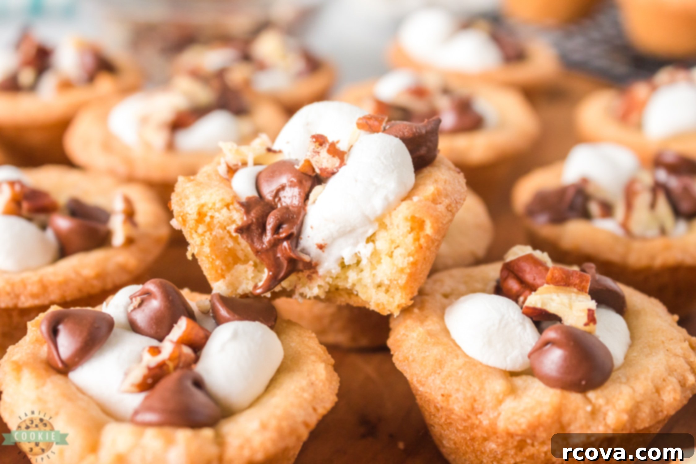 Decadent Rocky Road Cookie Cups 2 rocky road cookie cups with chocolate marshmallows and nuts, ready to be enjoyed