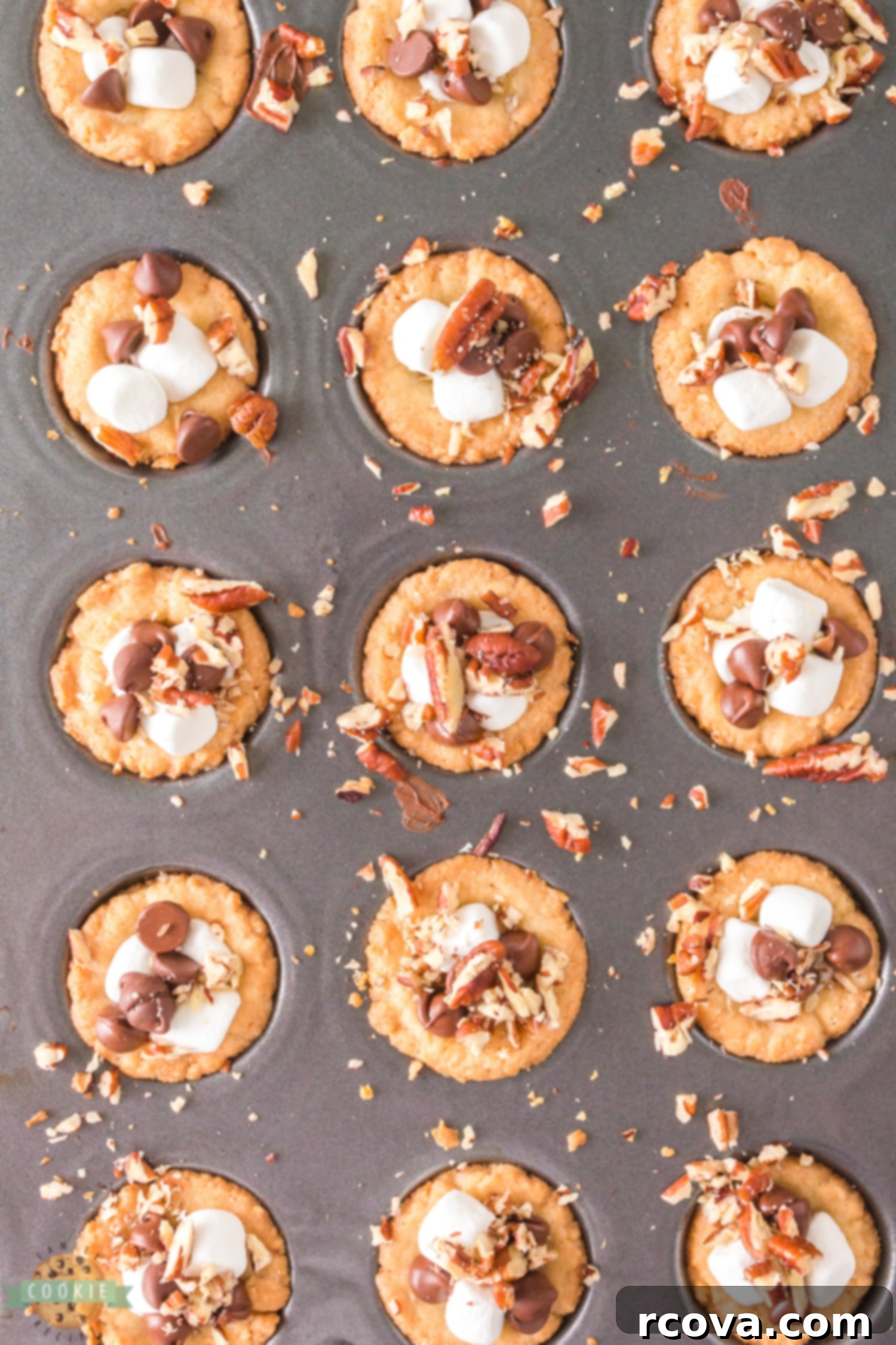 Decadent Rocky Road Cookie Cups 5 cookie dough in a mini muffin pan, with wells pressed into them