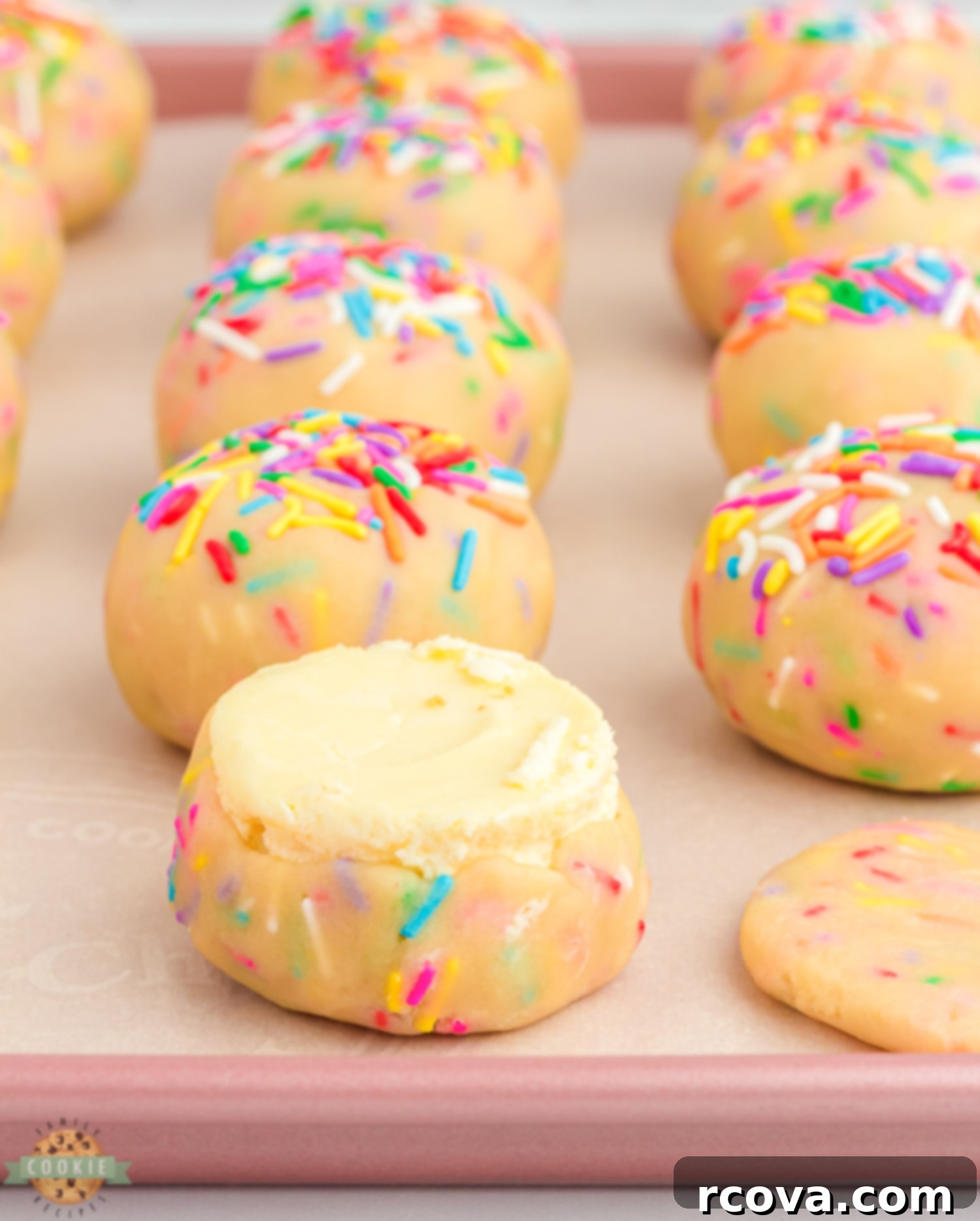 Cheesecake-Filled Funfetti Cookie Delights 5 encasing rounds of cheesecake in cookies