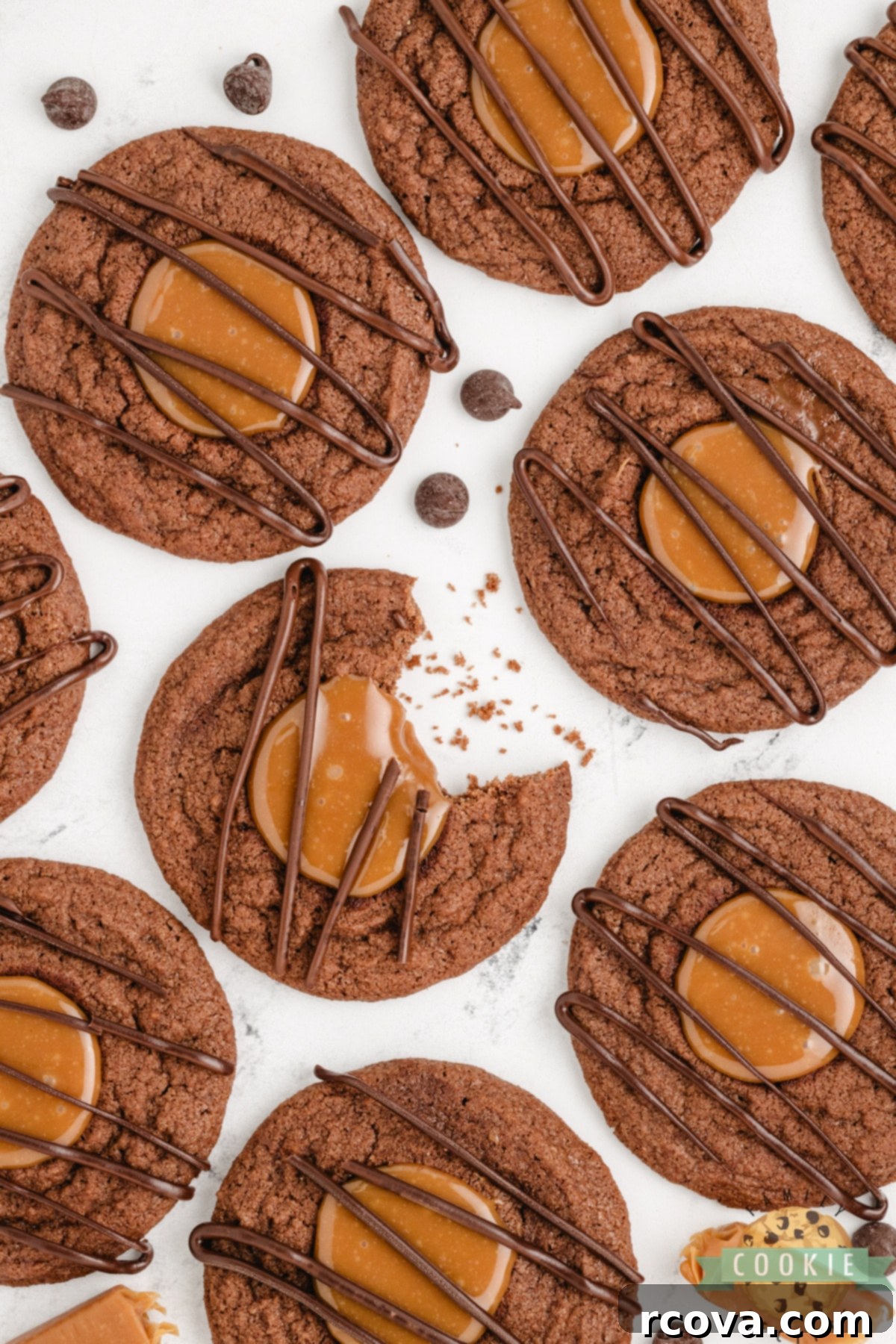 Decadent Caramel Brownie Thumbprint Cookies 12 A close-up of Caramel Brownie Thumbprint Cookies, showcasing the glossy chocolate drizzle over the caramel.