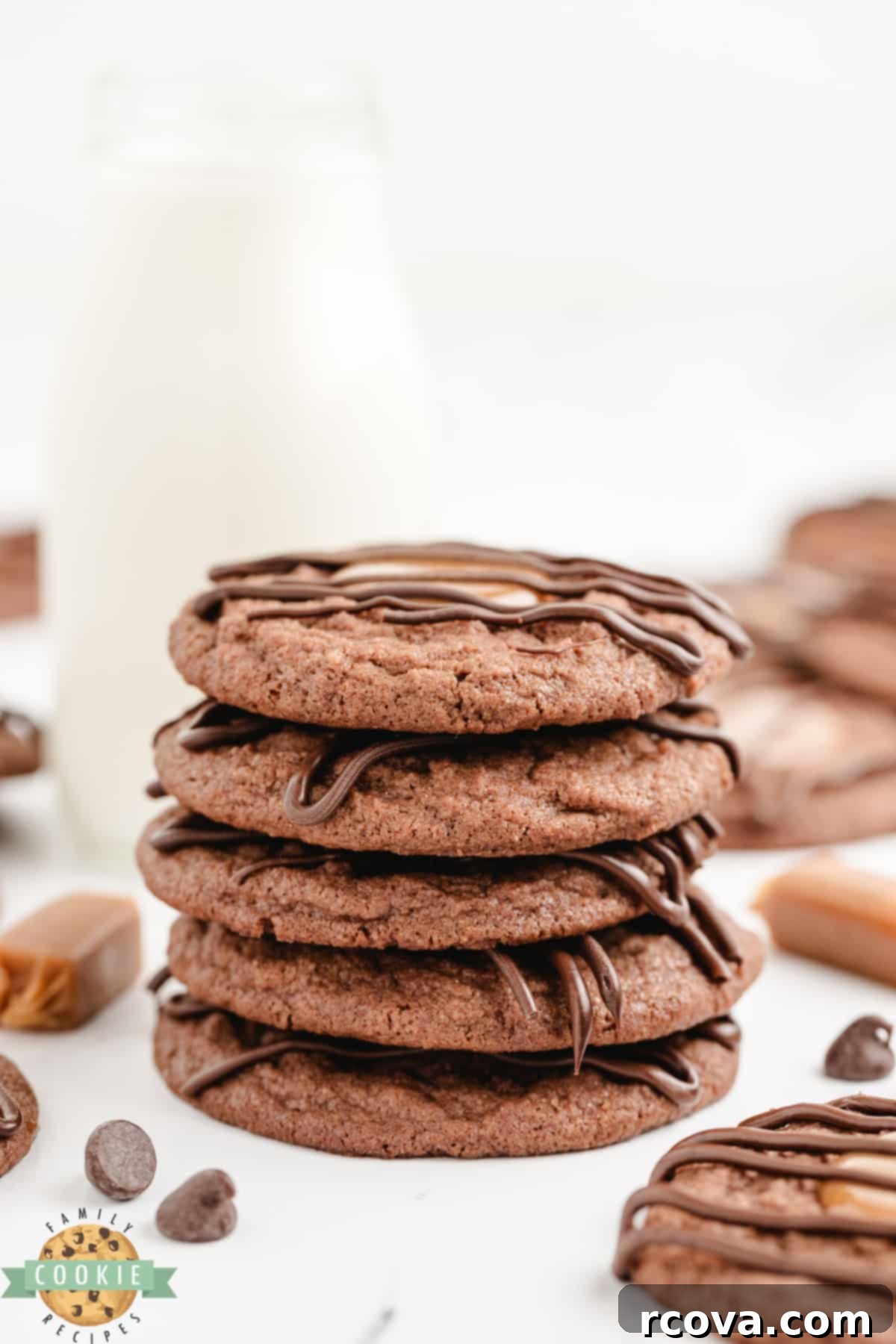 Decadent Caramel Brownie Thumbprint Cookies 4 A stack of freshly baked chocolate thumbprint cookies, ready for filling.
