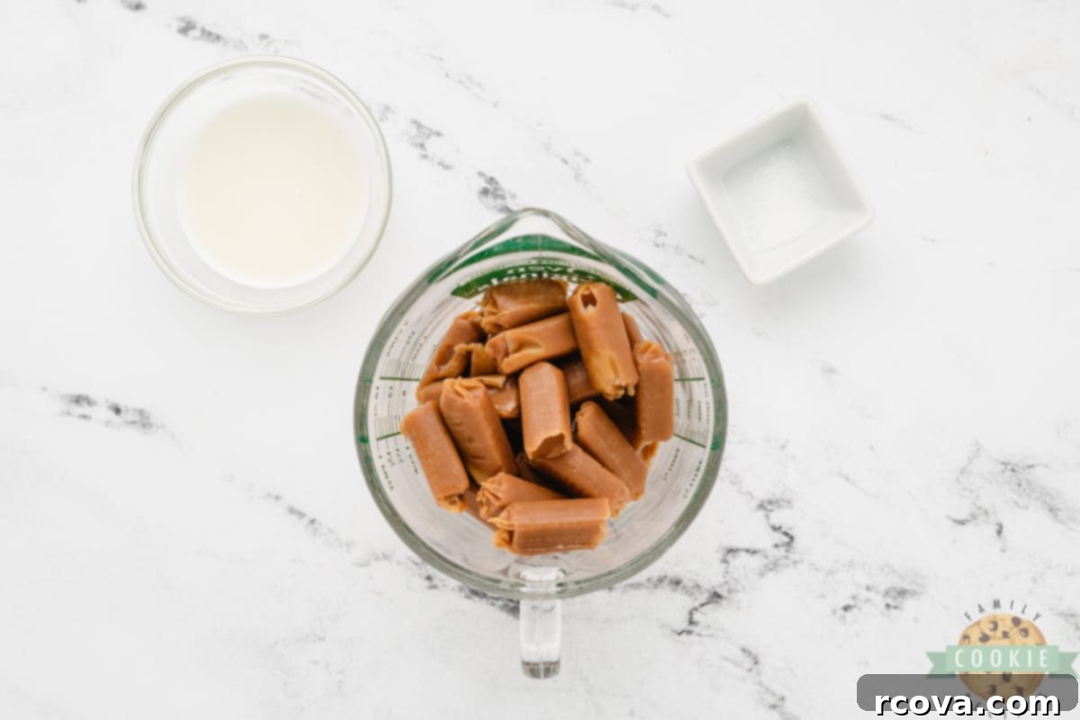Decadent Caramel Brownie Thumbprint Cookies 6 Unwrapped caramels melting in a glass measuring cup in the microwave.