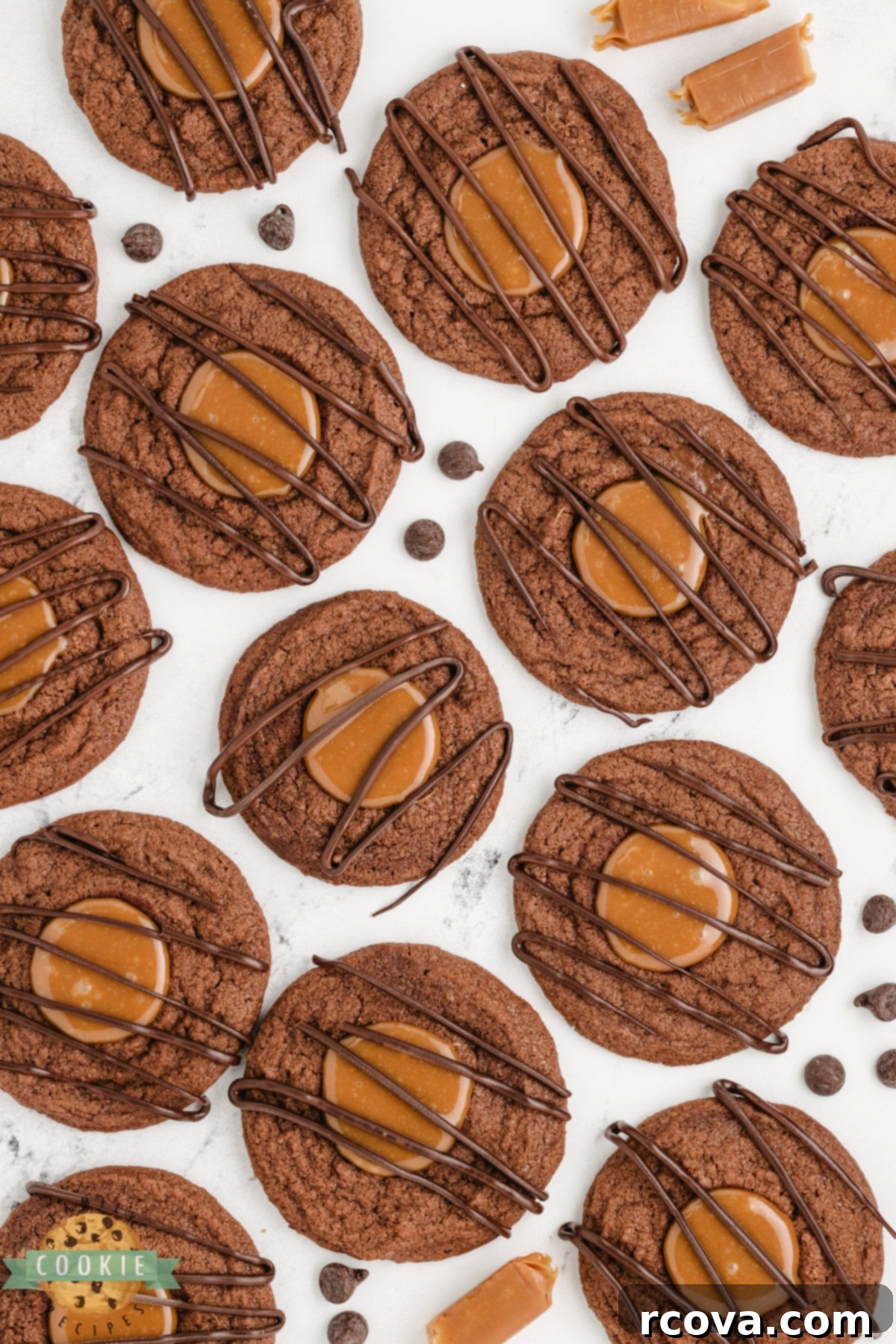 Decadent Caramel Brownie Thumbprint Cookies 7 Chocolate thumbprint cookies with caramel filling, drizzled with melted chocolate.