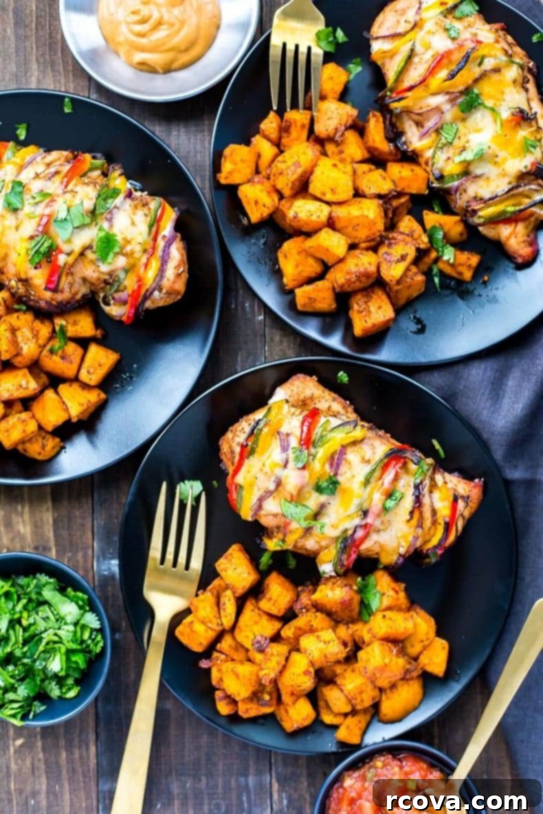 Hasselback Fiesta Chicken with Smoky Fajita Filling 5 Plated Hasselback Fajita Stuffed Chicken with roasted sweet potatoes, cilantro, and sauces