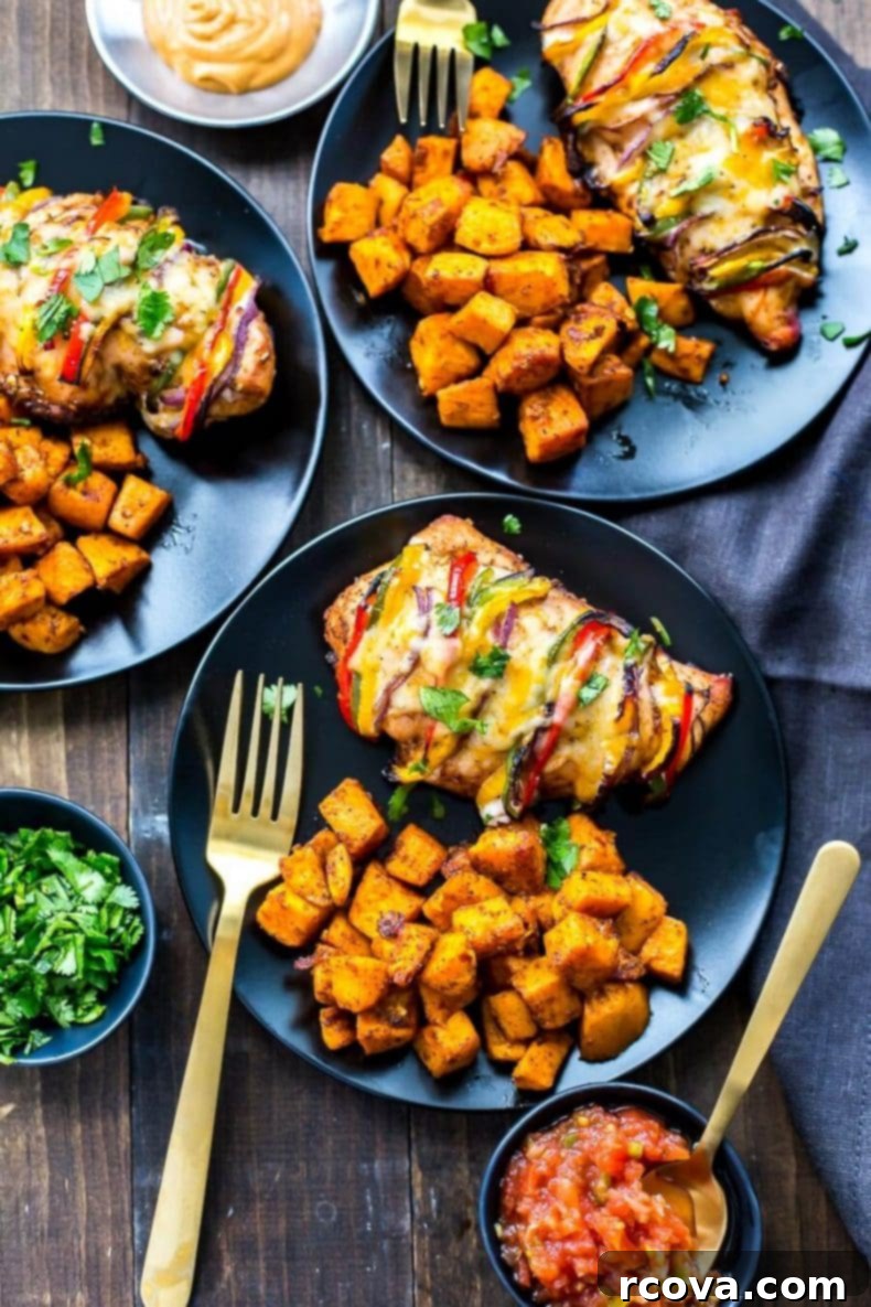 Hasselback Fiesta Chicken with Smoky Fajita Filling 8 Stacked Hasselback Fajita Stuffed Chicken on a cutting board, ready to serve