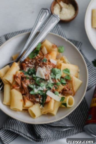 Effortless Halloween Dinners 3 Instant Pot Pulled Pork Ragu over rigatoni noodles in a white bowl