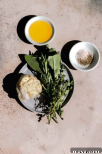 Perfect Air Fryer Turkey Breast 3 ingredients for rub include minced garlic, fresh sage, thyme and rosemary with salt and pepper and olive oil.