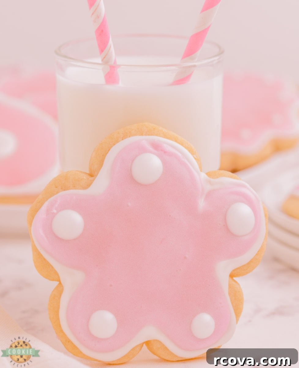 Zesty Lemon Shaped Sugar Cookies 2 Cute pink flower sugar cookie with lemon flavor, delicately frosted
