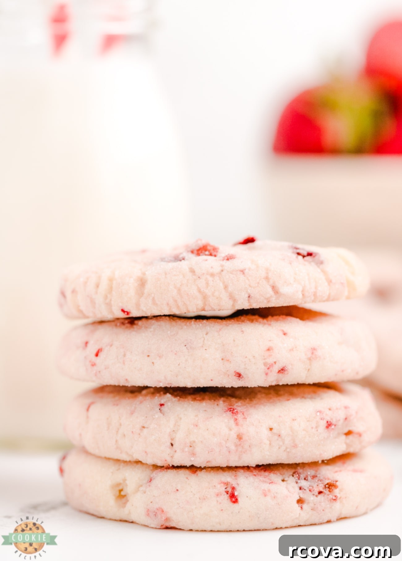 Luscious Strawberry Cream Cheese Sugar Cookies 9 A stack of perfectly baked strawberry cream cheese sugar cookies