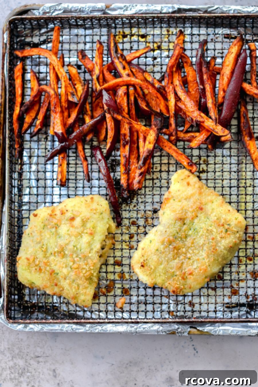 Crispy Air Fryer Frozen Cod 7 Sweet potato fries achieving golden perfection in an air fryer basket.